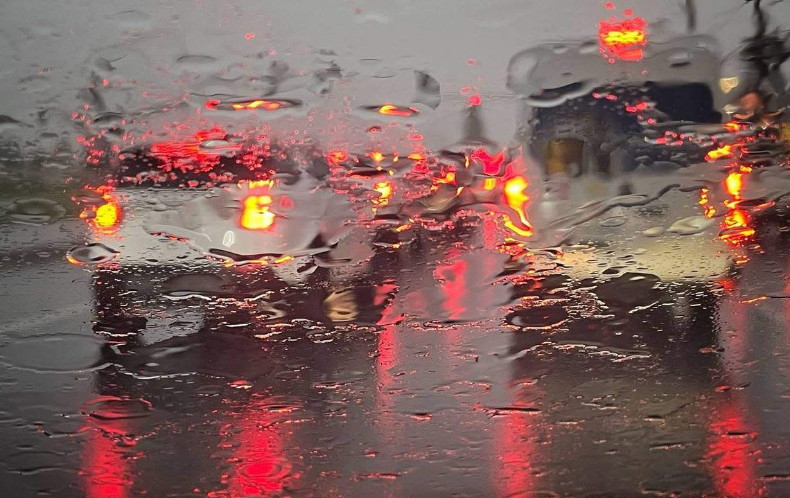 Rain hammers drivers on South Clovis Avenue near Tulare Avenue in Fresno, California, on Thursday, Jan. 5, 2023.