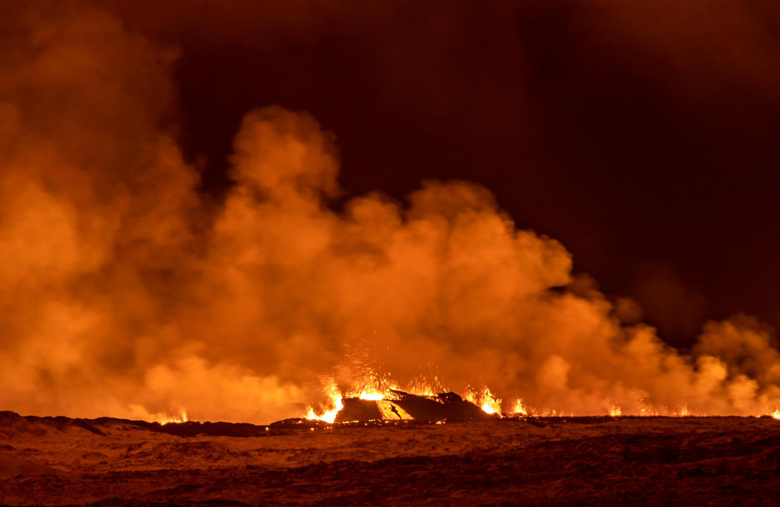 A volcano spews lava and smoke as it erupts in Grindavik, Iceland, December 18, 2023. (Photo by Snorri Thor/NurPhoto via Getty Images)