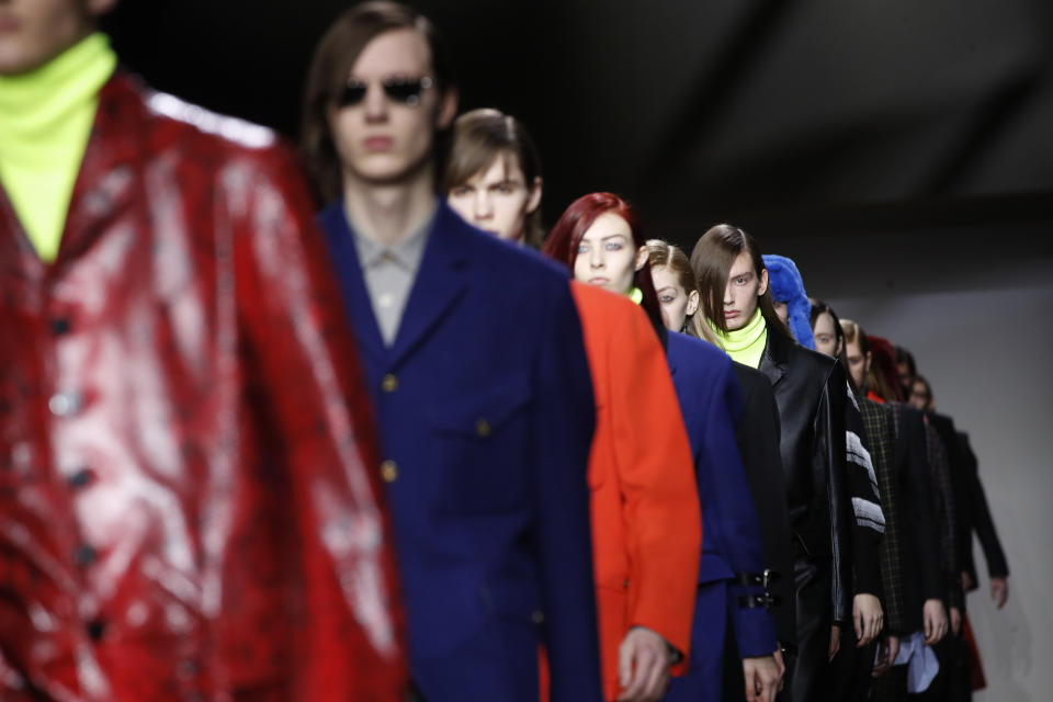 Models wear creations for the Paul Smith men's Fall/Winter 2019/20 fashion collection presented in Paris, Sunday Jan.19, 2019. (AP Photo/Christophe Ena)