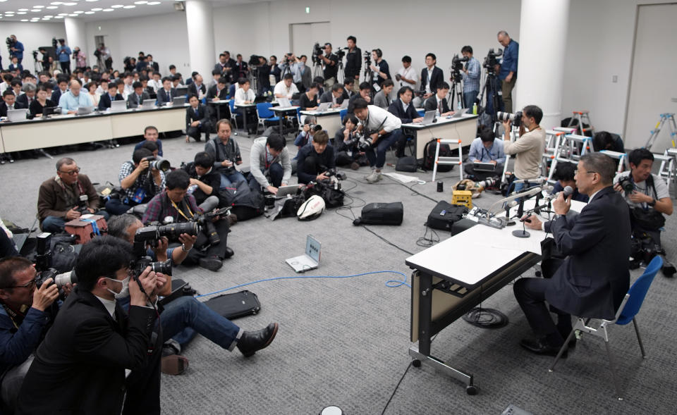 Nissan Motor Co. President and Chief Executive Officer Hiroto Saikawa speaks during a press conference at Nissan Motor Co. Global Headquarter Monday Nov. 19, 2018 in Yokohama, near Tokyo. Nissan Motor Co.'s high-flying chairman Carlos Ghosn was arrested Monday and will be dismissed after he allegedly under-reported his income and engaged in other misconduct, the company said Monday. (AP Photo/Shuji Kajiyama)