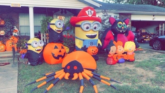 Disney, Minions and other character inflatables cover the front lawn of the home at 3432 S. Jefferson Ave.