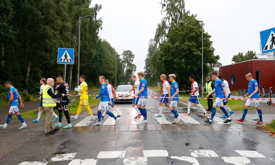 <span>Before matches at the KFUM Arena, teams have to cross a zebra crossing from the dressing rooms to the 3,000 capacity stadium.</span><span>Photograph: KFUM</span>