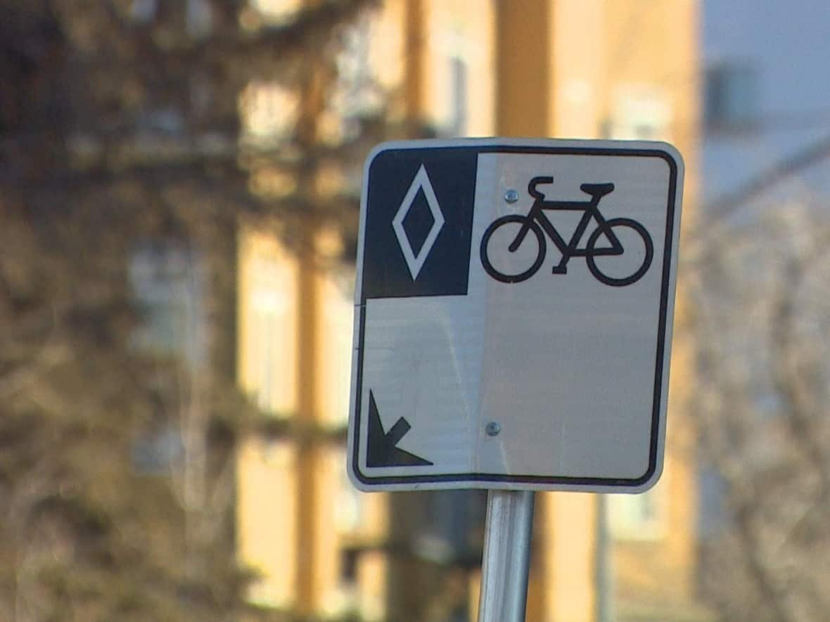 The new, protected bike lane will likely be on the north side of 15th Avenue S.W. (CBC - image credit)