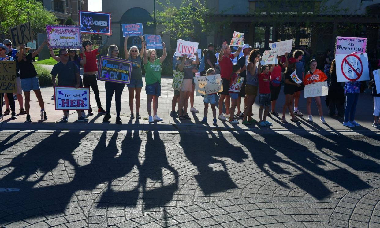 <span>People protest Arizona supreme court’s revival of a law dating to 1864 that bans abortion in virtually all instances.</span><span>Photograph: Caitlin O’Hara/Reuters</span>