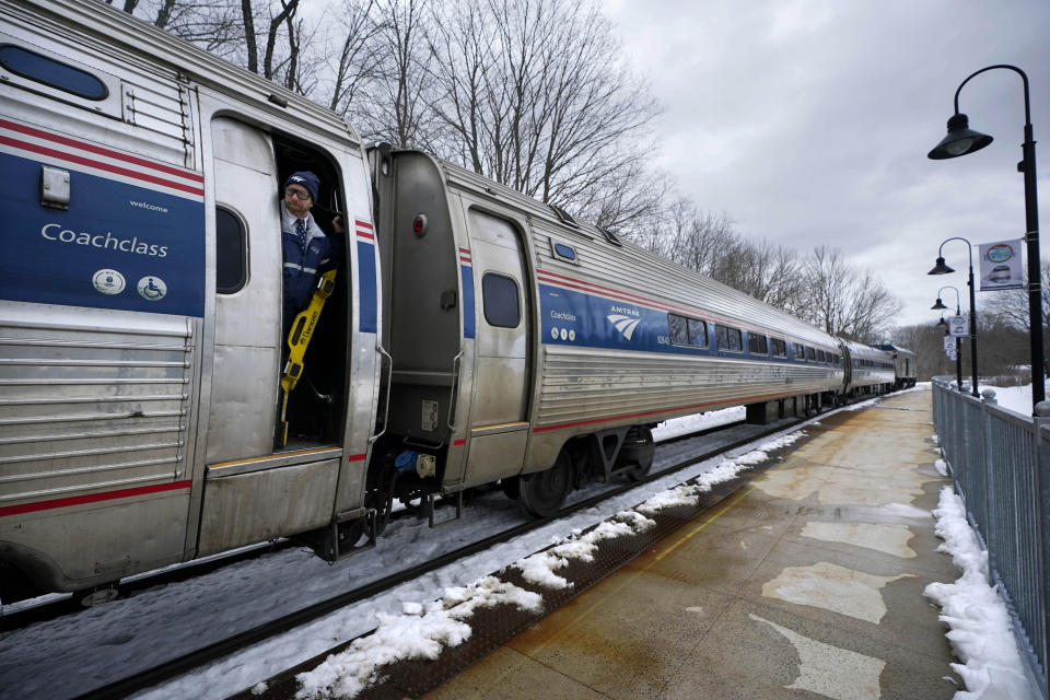 The Amtrak Downeaster departs at the station, Wednesday, March 8, 2023, in Freeport, Maine. The New Hampshire Liquor Commission says it is "exploring a creative solution" after saying an Amtrak route from Maine to Boston can't serve alcohol while passing through 35 miles of New Hampshire. (AP Photo/Robert F. Bukaty)