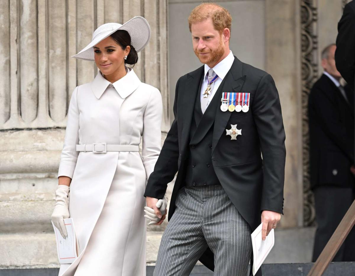 Meghan Markle smiles warmly at Princess Charlotte after procession