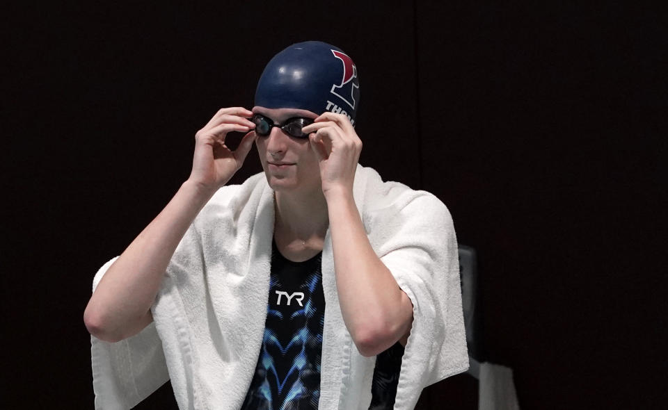 Penn's Lia Thomas waits to compete in a qualifying heat of the 500 yard freestyle event at the Ivy League Women's Swimming and Diving Championships at Harvard University, Thursday, Feb. 17, 2022, in Cambridge, Mass. Thomas, who is transitioning to female, is swimming for the University of Pennsylvania's women's team. (AP Photo/Mary Schwalm)