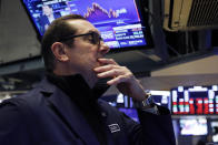 William O'Keefe works on the floor of the New York Stock Exchange, Friday, Feb. 28, 2020. Stocks are opening sharply lower on Wall Street, putting the market on track for its worst week since October 2008 during the global financial crisis. (AP Photo/Richard Drew)