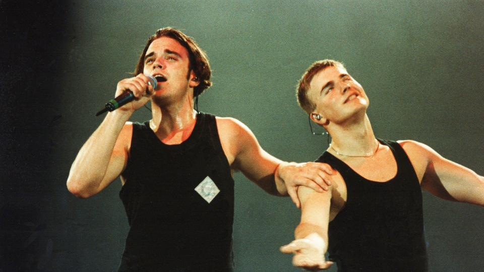 Gary and Robbie performing on stage in 1993 