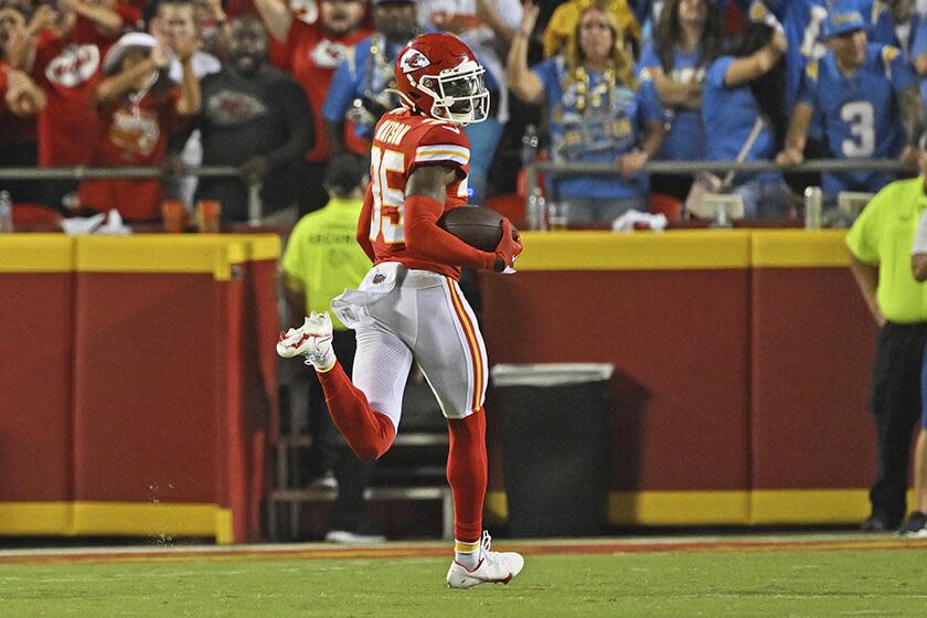 Kansas City's Jaylen Watson returns an interception for a touchdown against the Chargers this season.