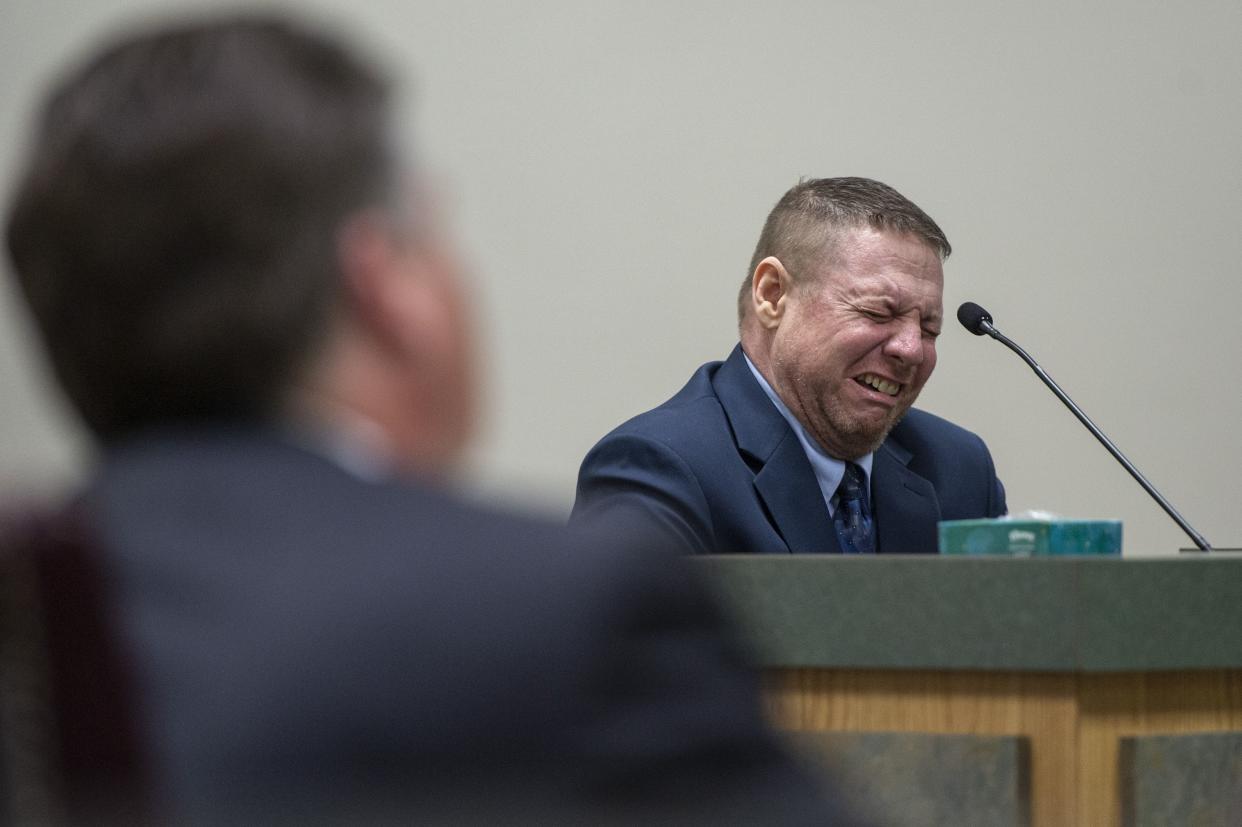 Jacob Blair Scott, who is accused of sexually assaulting a minor, cries out while on the witness stand during his trial in Pascagoula, Miss., on Wednesday. (Hannah Ruhoff/The Sun Herald via AP)