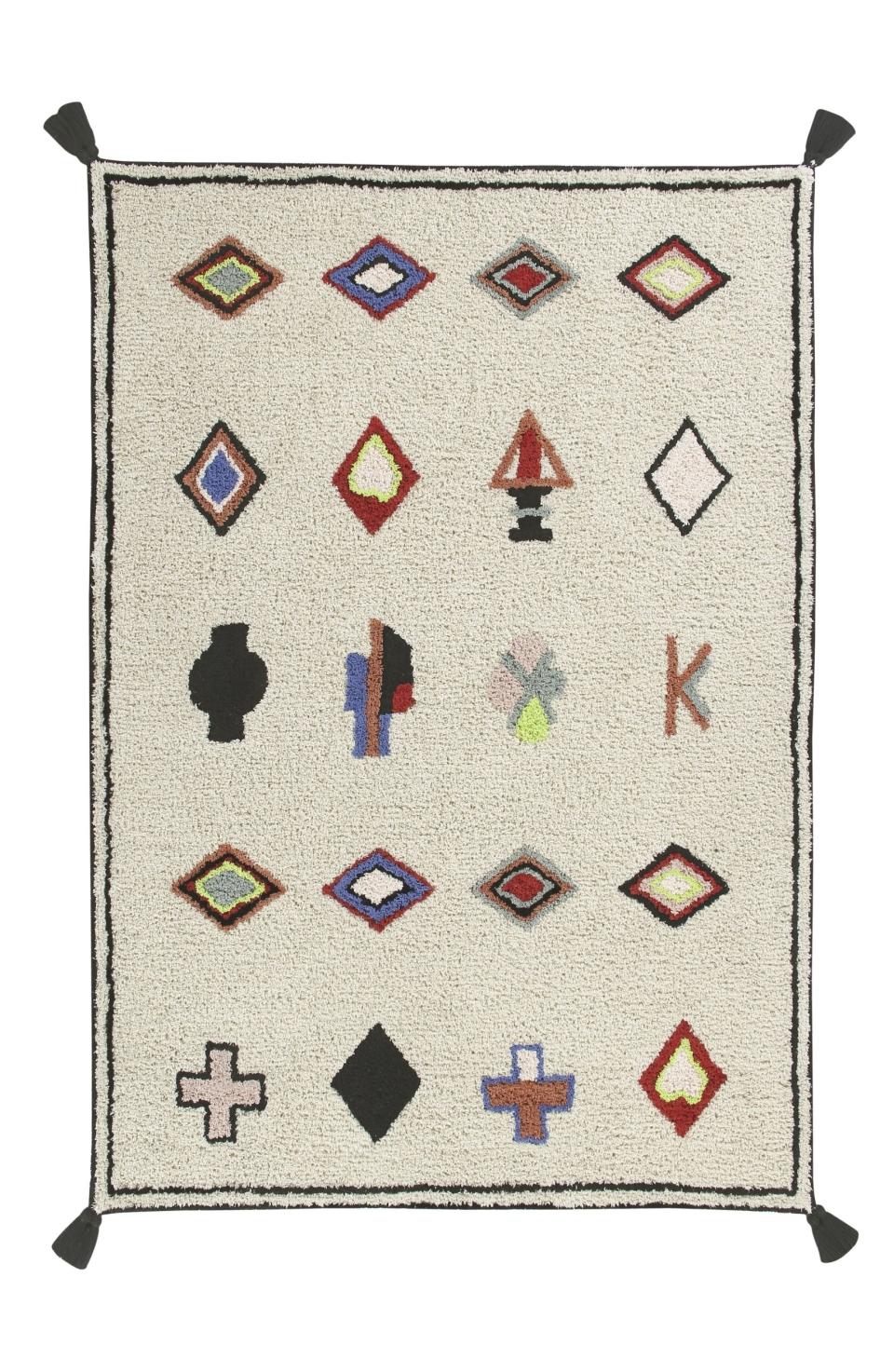 <strong>Sold Out</strong> A 4'7" x 6'7" rug for this price is a steal, and you know <a rel="nofollow noopener" href="https://www.architecturaldigest.com/story/13-abstract-throws-that-will-instantly-make-over-a-blah-home?mbid=synd_yahoo_rss" target="_blank" data-ylk="slk:we love abstract anything;elm:context_link;itc:0;sec:content-canvas" class="link ">we love abstract anything</a>. <a rel="nofollow noopener" href="https://click.linksynergy.com/deeplink?id=FFSlEqCCN*I&mid=1237&murl=https://shop.nordstrom.com/s/lorena-canals-naador-rug/4908325" target="_blank" data-ylk="slk:SHOP NOW;elm:context_link;itc:0;sec:content-canvas" class="link ">SHOP NOW</a>: Naador Rug by Lorena Canals, $180 $269