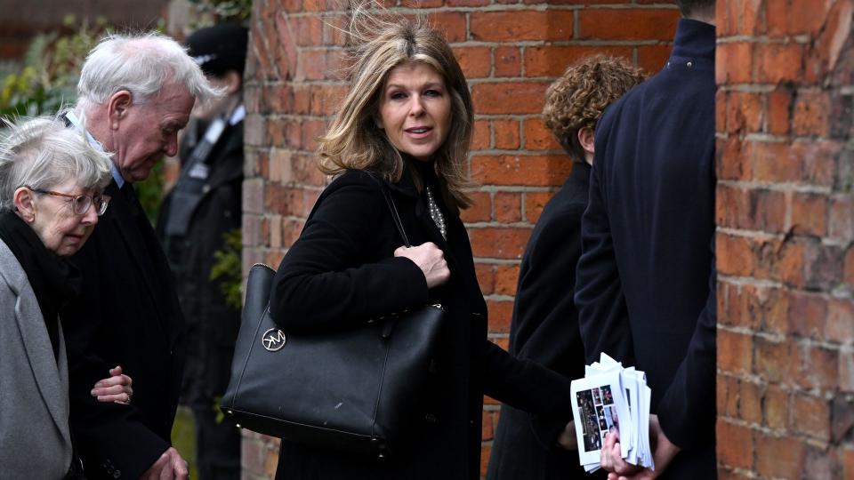 Kate Garraway entered the church after her children