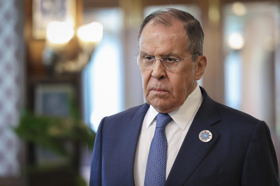 In this handout photo released by Russian Foreign Ministry Press Service, Russian Foreign Minister Sergey Lavrov listens during a news conference on the sideline of Foreign ministers of the Shanghai Cooperation Organization meeting in India's tourist hotspot Goa, Friday, May 5, 2023. (Russian Foreign Ministry Press Service via AP)