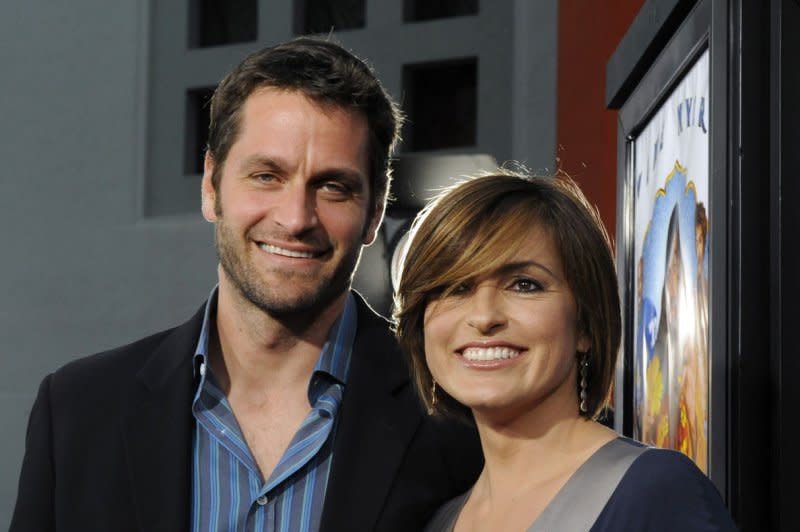 Mariska Hargitay (R) and Peter Hermann attend the Los Angeles premiere of "The Love Guru" in 2008. File Photo by Jim Ruymen/UPI