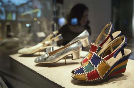 Italian leather shoes are displayed during a media preview at "The Glamour of Italian Fashion 1945-2014" exhibition, at the Victoria and Albert Museum in London April 2, 2014. REUTERS/Neil Hall