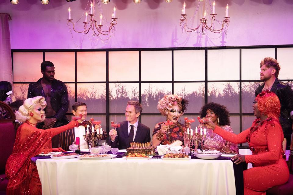 drag me to dinner cast at a table
