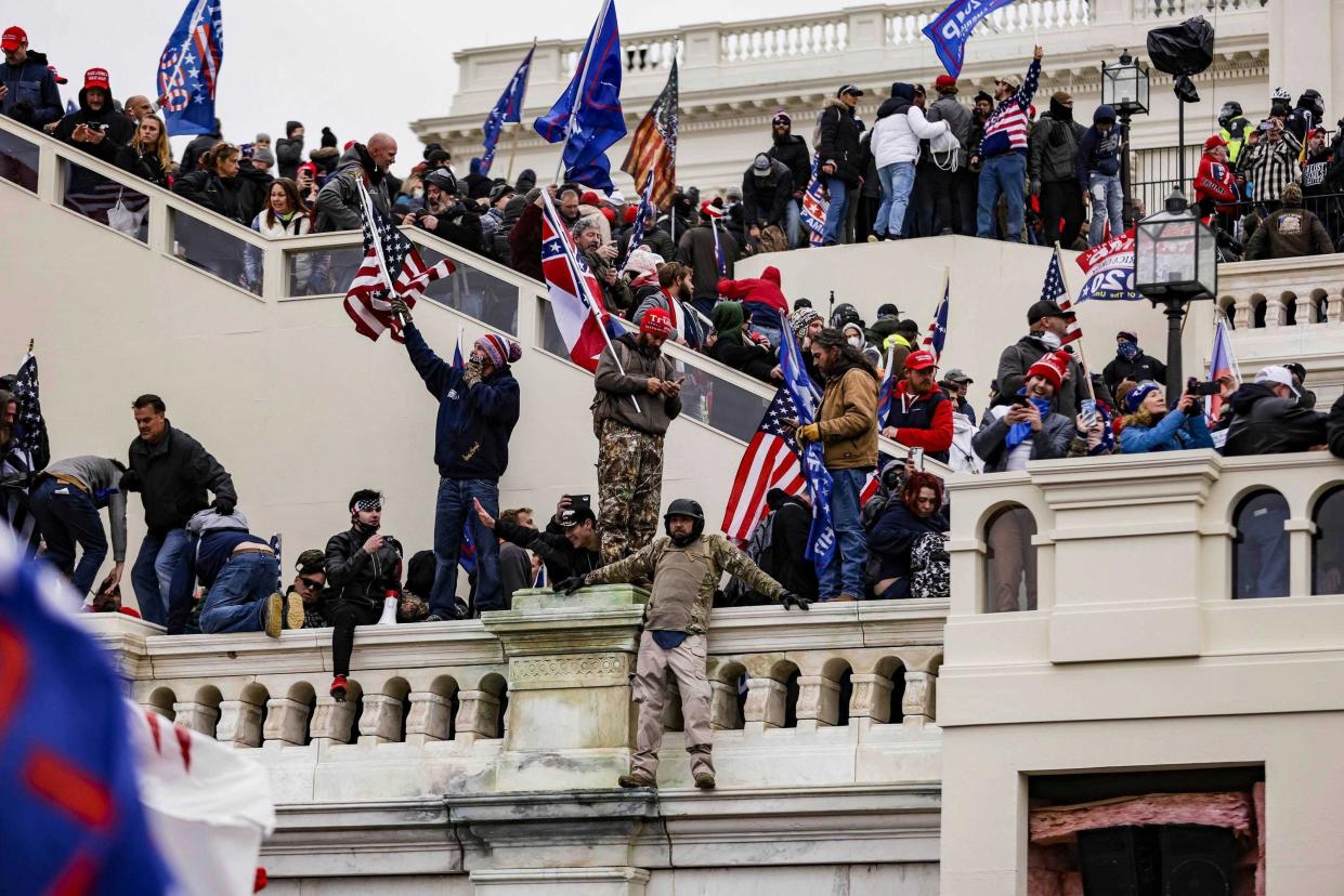 Pro-Trump supporters storm the U.S. Capitol following a rally with President Donald Trump on Jan. 6, 2021, in Washington.