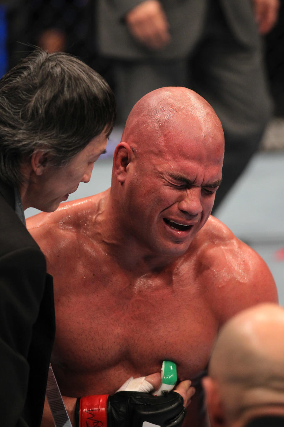 Tito Ortiz exhibits the pain of a blow to the ribs after his TKO loss to Antonio Rogerio Nogueira during the UFC 140 event at Air Canada Centre on December 10, 2011 in Toronto, Ontario, Canada. (Photo by Nick Laham/Zuffa LLC/Zuffa LLC via Getty Images)