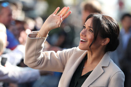 Britain's Meghan, Duchess of Sussex greets well-wishers as she arrives for a visit to Edes House, in Chichester, Britain October 3, 2018. Daniel Leal-Olivas/pool via Reuters