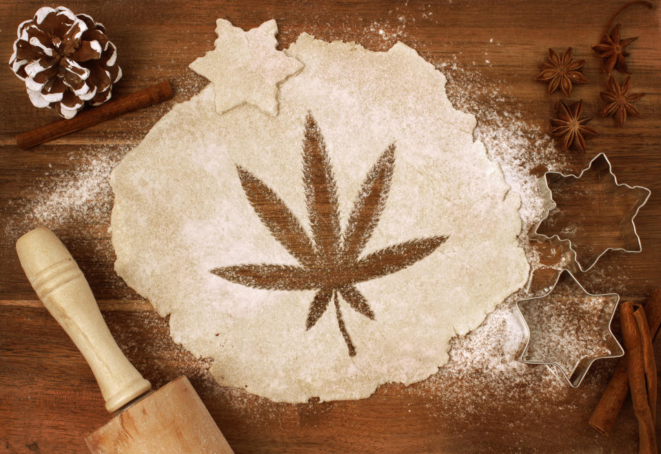 Flour on a table with a marijuana leaf