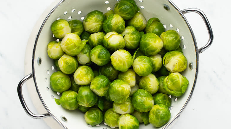 Brussels sprouts in a colander