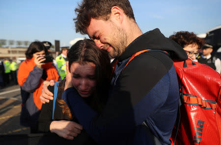 Climate change activists react during an Extinction Rebellion protest outside Heathrow Airport in London, Britain April 19, 2019. REUTERS/Simon Dawson