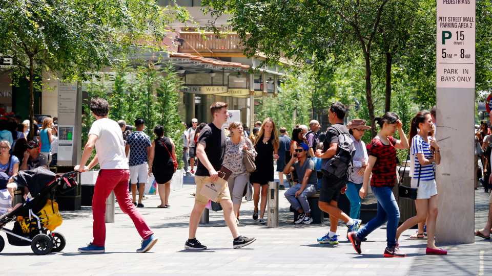 A crowd of people walking on a street in Sydney to represent jobseekers.