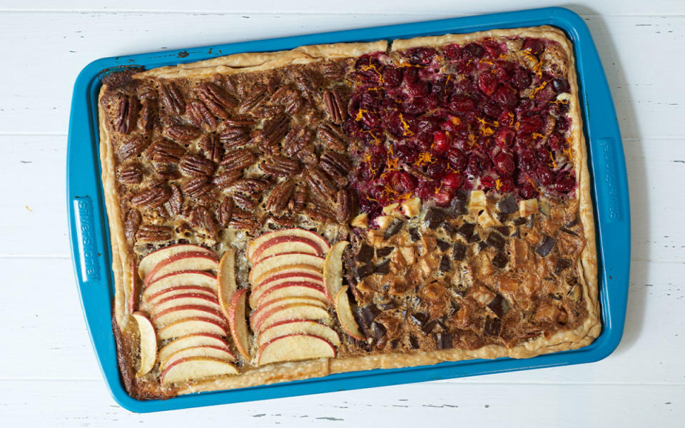 <p>Mark Boughton Photography / styling by Teresa Blackburn</p><p>Why stop at one kind of pie for the holidays when you can make four in one? You can also cut this slab pie into whatever size of slices you'd like!</p><p><strong>Get the recipe: <a href="https://parade.com/940802/parade/add-variety-to-the-thanksgiving-dessert-table-with-a-4-flavor-slab-pecan-pie/" rel="nofollow noopener" target="_blank" data-ylk="slk:4-Flavor Slab Pecan Pie;elm:context_link;itc:0;sec:content-canvas" class="link ">4-Flavor Slab Pecan Pie</a></strong></p>