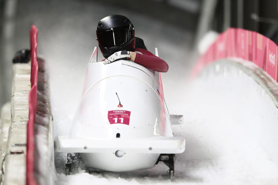 Nadezhda Sergeeva and Anastasia Kocherzhova of the Olympic Athlete from Russia react in the finish area during the Women’s Bobsleigh at the Olympic Sliding Centre on February 21, 2018 in Pyeongchang, South Korea. (Getty Images)