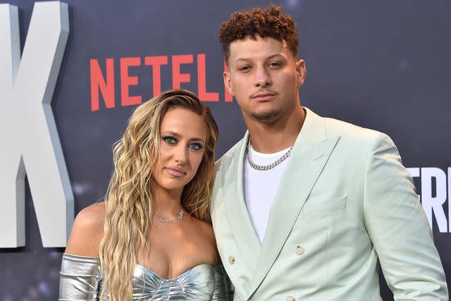 <p>CHRIS DELMAS/AFP via Getty Images</p> Patrick Mahomes and his wife Brittany Mahomes arrive for the premiere of Netflix's docuseries "Quarterback"