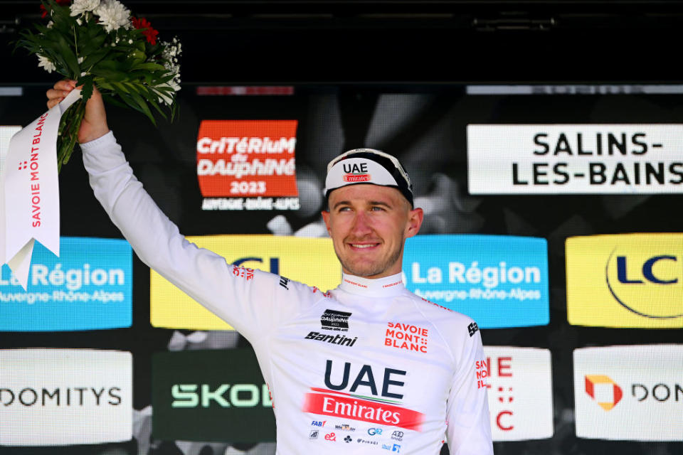 SALINSLESBAINS  JUNE 08 Mikkel Bjerg of Denmark and UAE Team Emirates celebrates at podium as White best young jersey winner during the 75th Criterium du Dauphine 2023 Stage 5 a 1911km stage from CormoranchesurSane to SalinslesBains  UCIWT  on June 08 2023 in SalinslesBains France Photo by Dario BelingheriGetty Images