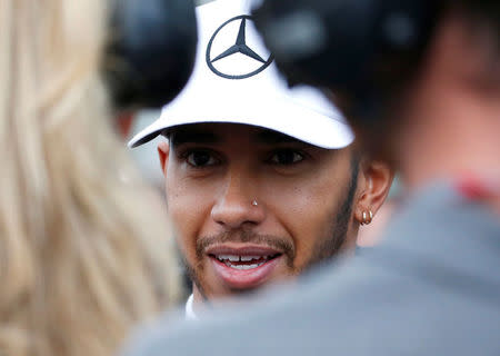 Formula One F1 - Japanese Grand Prix 2017 - Suzuka Circuit, Japan - October 7, 2017. Mercedes' Lewis Hamilton of Britain speaks to media after getting pole position in qualifying. REUTERS/Toru Hanai