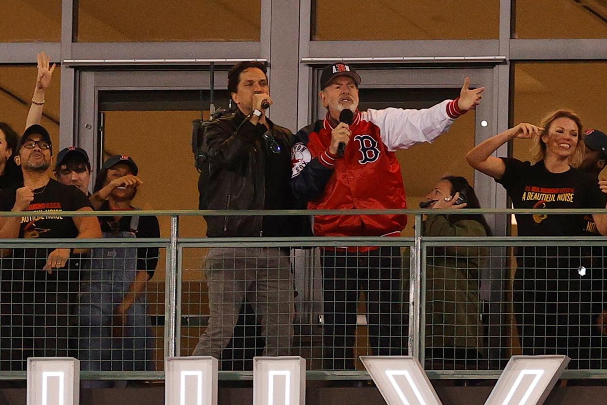 Singer-songwriter Neil Diamond performs "Sweet Caroline" during the eighth inning between the St. Louis Cardinals and the Boston Red Sox at Fenway Park on June 18, 2022 in Boston, Massachusetts.