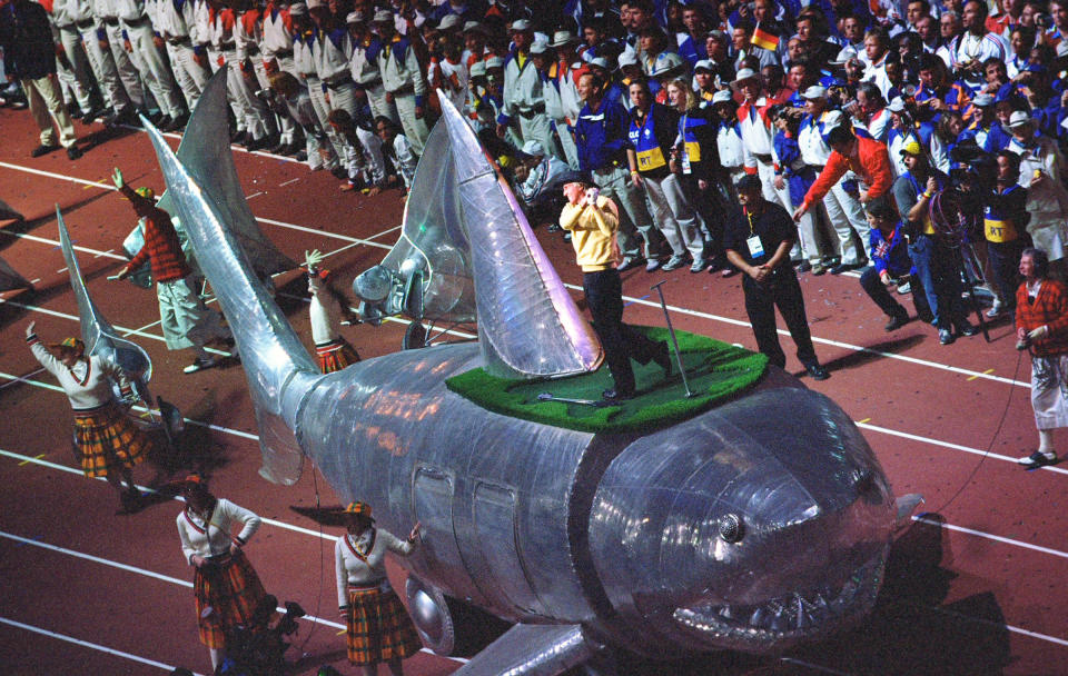 Greg Norman riding a metal shark at the Closing Ceremony for the 2000 Sydney Olympic Games. (Getty Images)