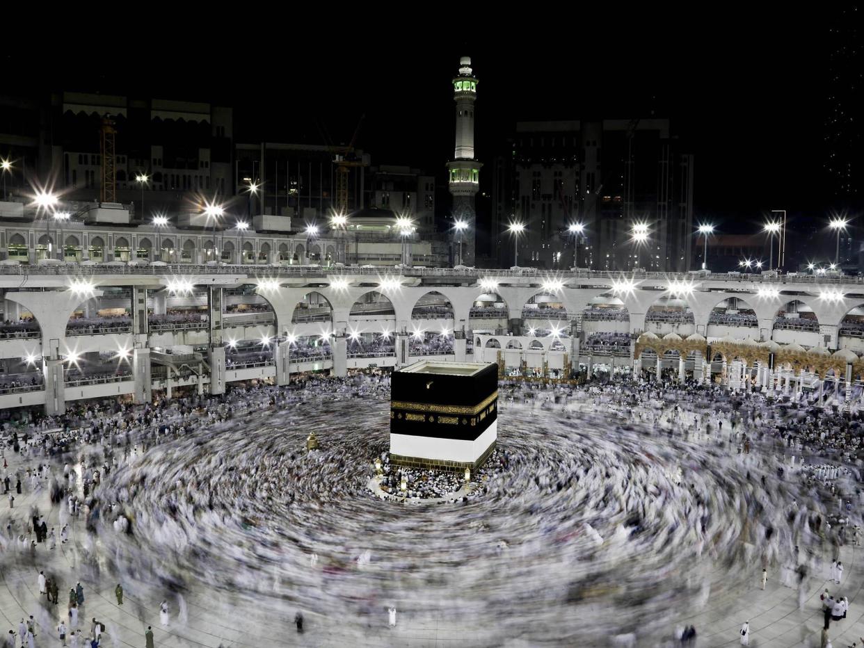 Mecca is the holiest site in the world for Muslims. Every year Muslims make the pilgrimage to the holy city of Mecca and circle the shrine, known as the Kaaba, seven times and then touch it: AP