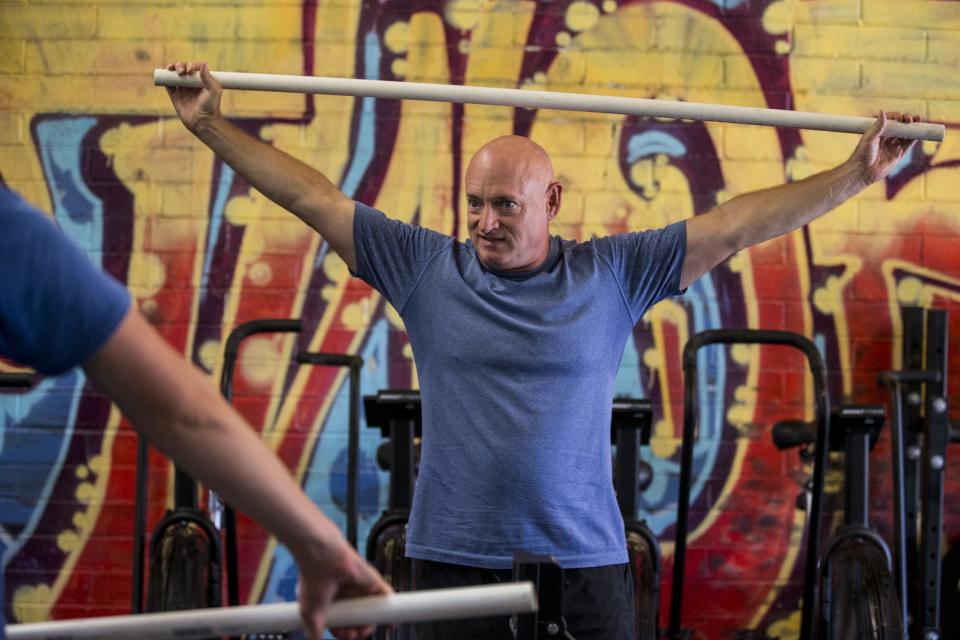 Mark Kelly works out at a Tucson gym to stay in top shape, just in case the former astronaut is called to fly again.