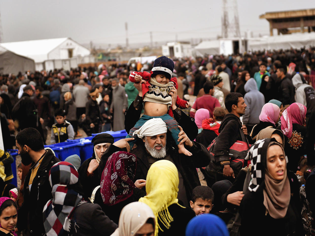 Displaced Iraqis from Mosul arrive at the Hamam al-Alil camp during the government forces ongoing offensive to retake the western parts of the city from Islamic State (IS) group fighters: Getty