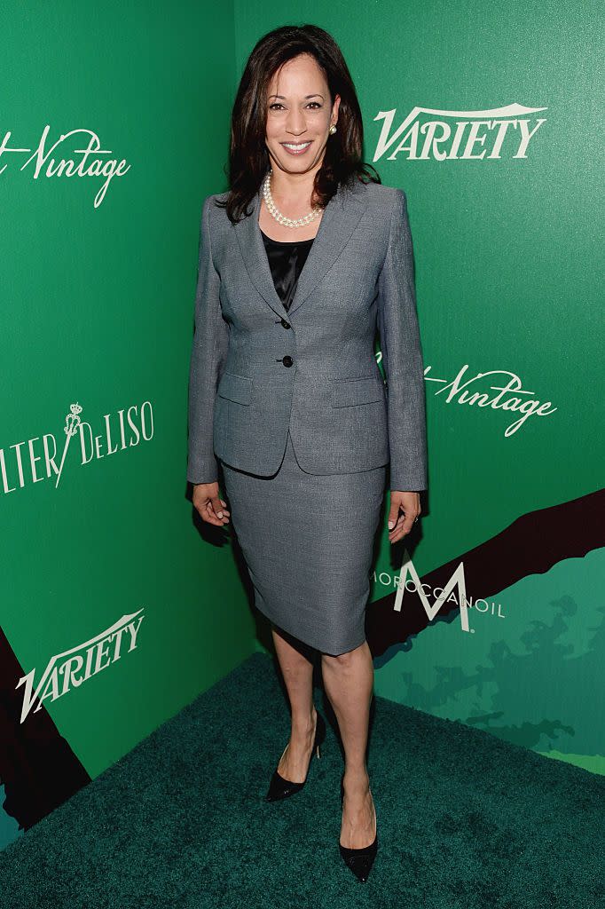 <p>Harris wore a skirt suit, with her iconic double string of pearls to the 2014 Variety Power of Women event. </p>