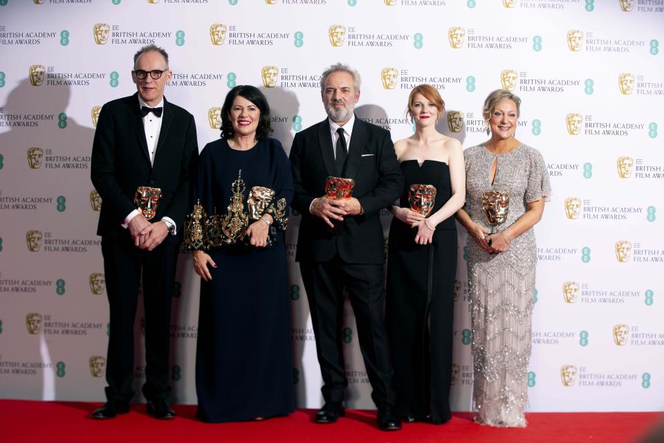 From left, Callum McDougall, Pippa Harris, Sam Mendes, Krysty Wilson-Cairms and Jayne-Anne Tengren, winners of the Outstanding British Film, pose backstage at the Bafta Film Awards, in central London, Sunday, Feb. 2, 2020. (Photo by Joel C Ryan/Invision/AP)