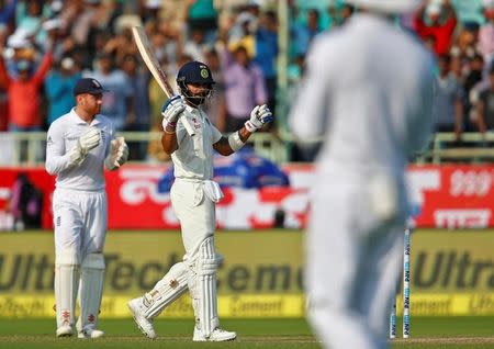 Cricket - India v England - Second Test cricket match - Dr. Y.S. Rajasekhara Reddy ACA-VDCA Cricket Stadium, Visakhapatnam, India - 17/11/16 - India's Virat Kohli celebrates after scoring his century. REUTERS/Danish Siddiqui