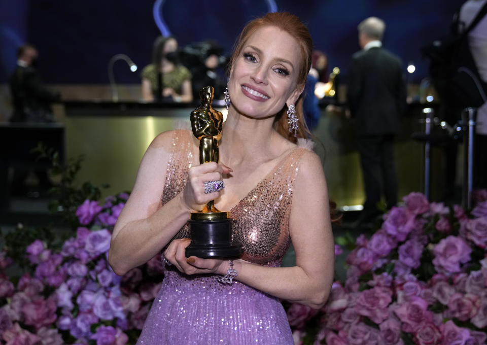 Jessica Chastain, winner of the award for best performance by an actress in a leading role for "The Eyes of Tammy Faye," poses at the Governors Ball after the Oscars on Sunday, March 27, 2022, at the Dolby Theatre in Los Angeles. (AP Photo/John Locher)