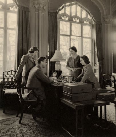 <p>Royal Collection Trust/His Majesty King Charles III 2024</p> Then-Princess Elizabeth, King George VI, the Queen Mother and Princess Margaret at Royal Lodge in 1943.
