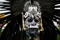 <p>A reveller gets ready to dance during a “pow-wow” celebrating the Indigenous Peoples’ Day Festival in Randalls Island, in New York, Oct. 8, 2017. (Photo: Eduardo Munoz/Reuters) </p>