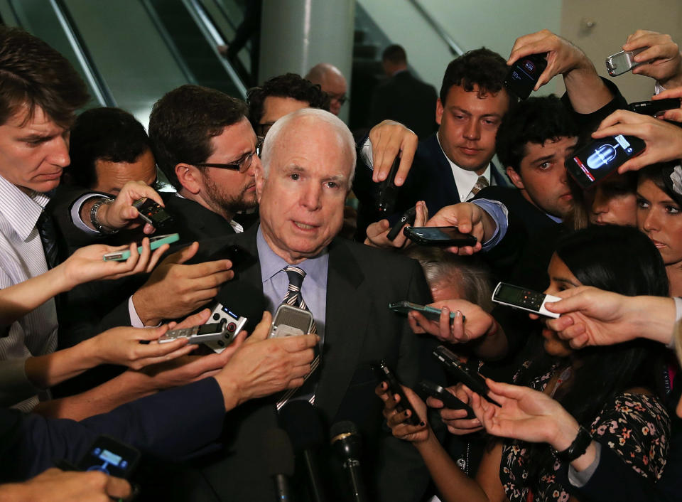 <p>Sen. John McCain talks to reporters after leaving a closed-door meeting about Syria at the U.S. Capitol on Sept. 4, 2013, in Washington, D.C. (Photo: Mark Wilson/Getty Images) </p>