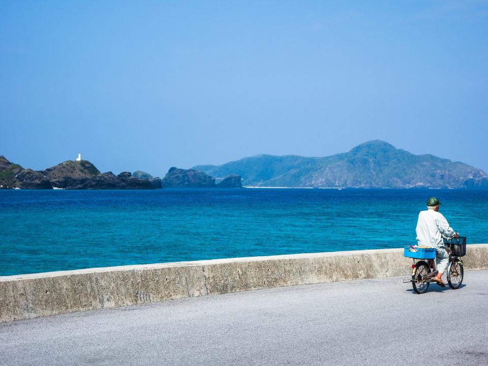 Man riding bike in Okinawa