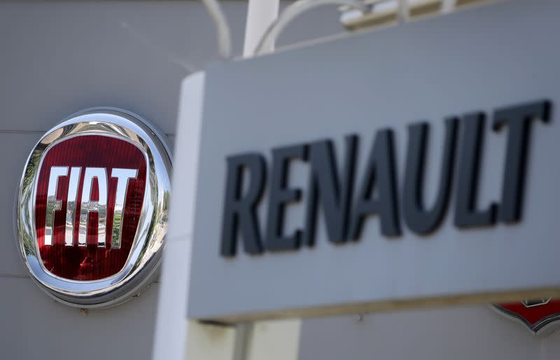 FILE PHOTO: The logos of Renault and Fiat carmakers are seen in Nice