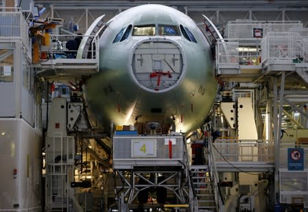 An Airbus A330neo is pictured on its final assembly line at Airbus headquarters in Colomiers, near Toulouse