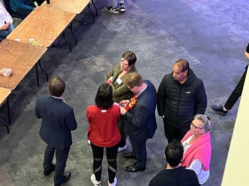 Jess Phillips consults with people during the count