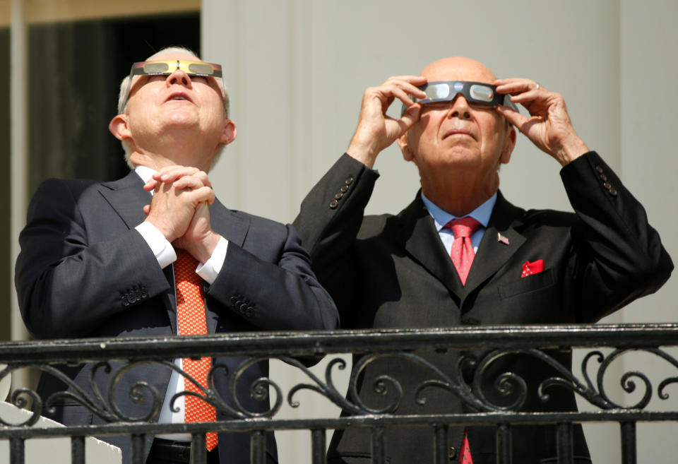 Attorney General Jeff Sessions, left, and Commerce Secretary Wilbur Ross watch from the White House.&nbsp;